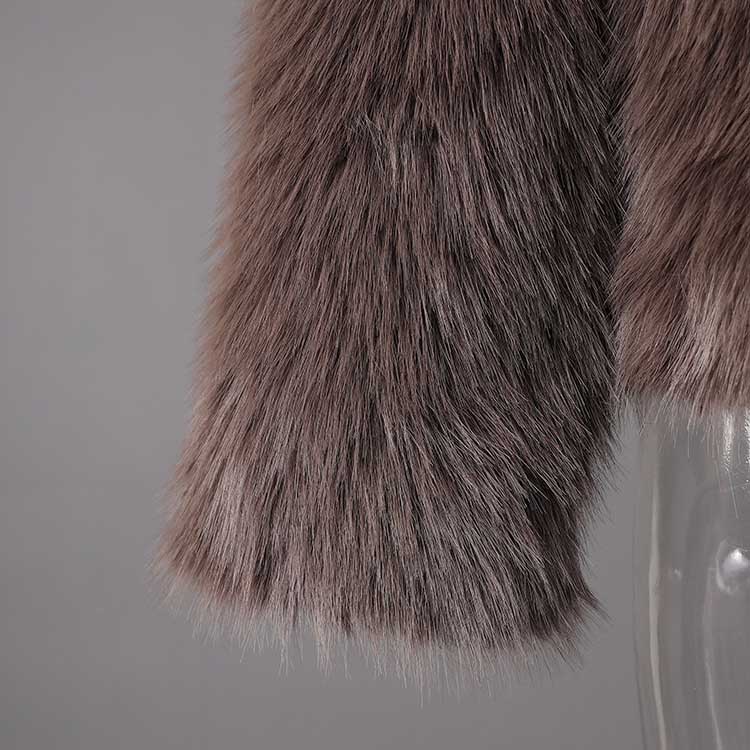 Brown faux fur short jacket with a soft texture, perfect for stylish layering in cooler weather