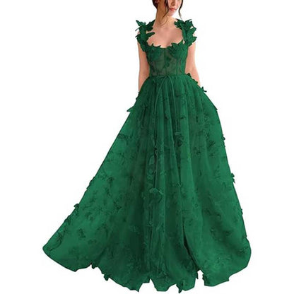 Elegant green butterfly tulle prom dress with floral details and flowy skirt for special occasions