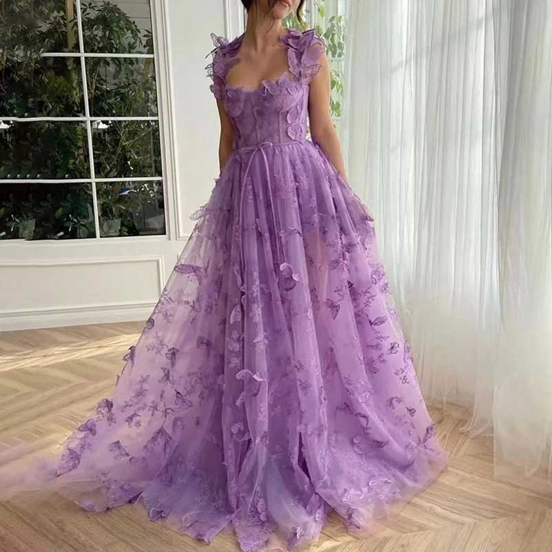 Elegant butterfly tulle prom dress in lavender featuring butterfly appliques and a flowing silhouette