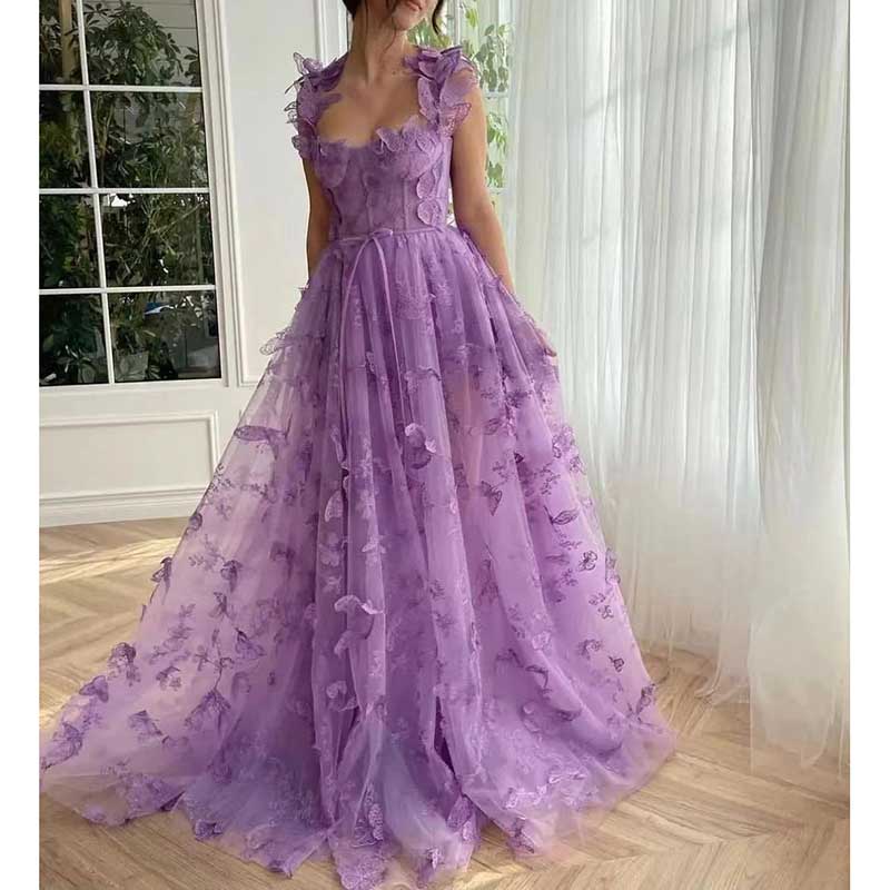 Lavender butterfly tulle prom dress with delicate floral details and ruffled sleeves for a stunning look
