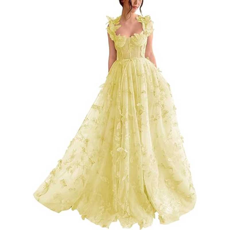 SD Dresscode butterfly tulle prom dress in soft yellow with floral embellishments and flowing skirt