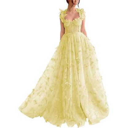 SD Dresscode butterfly tulle prom dress in soft yellow with floral embellishments and flowing skirt