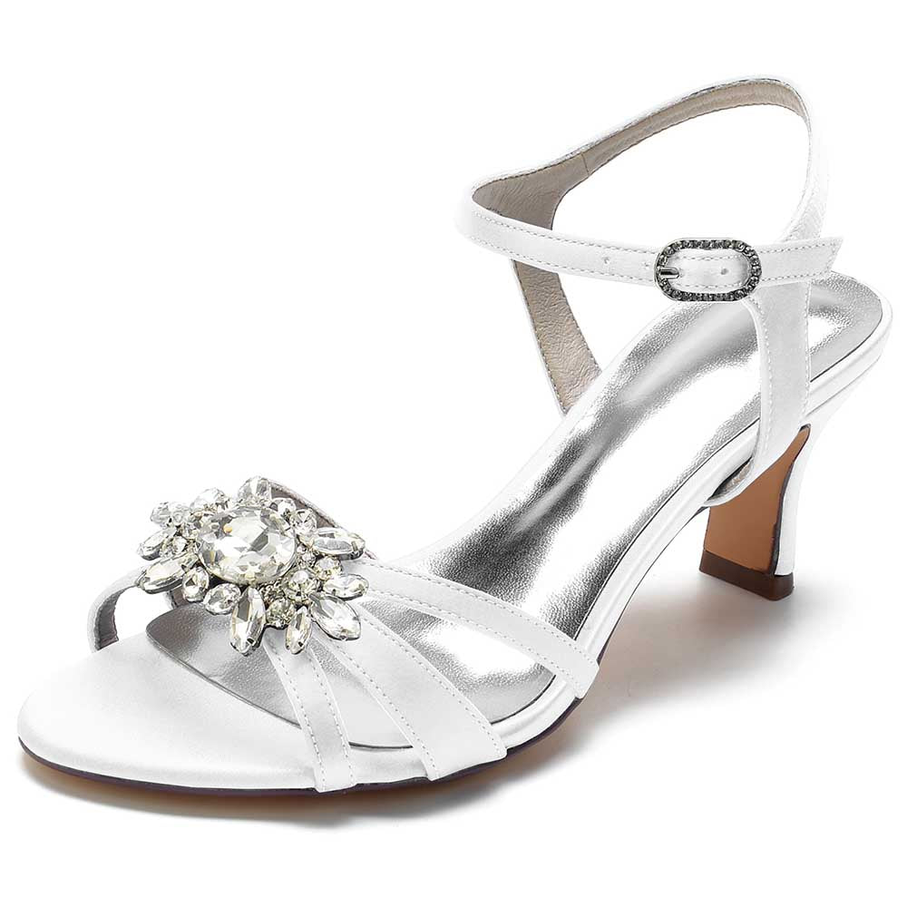 Elegant white chic strappy sandals for prom with a sparkling gem embellishment on the front
