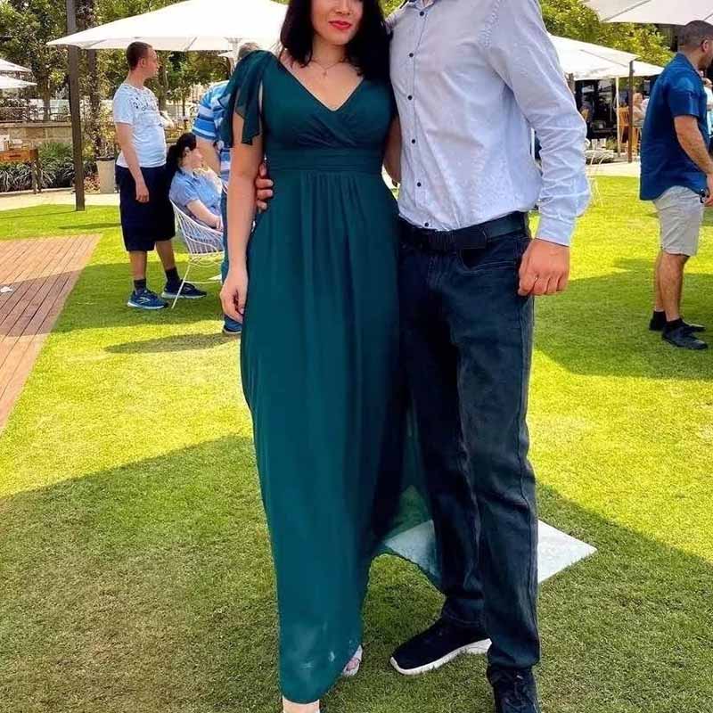 Elegant chiffon bridesmaid dress with slit in green, perfect for outdoor wedding celebrations