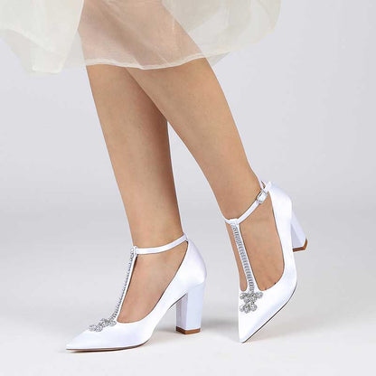 Elegant S&DCo. chunky block heel wedding shoes in white with decorative details and T-strap design