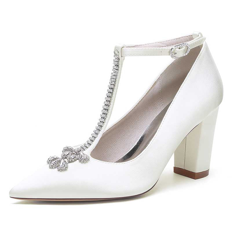 Elegant white chunky block heel wedding shoes with intricate beaded detailing on the T-strap