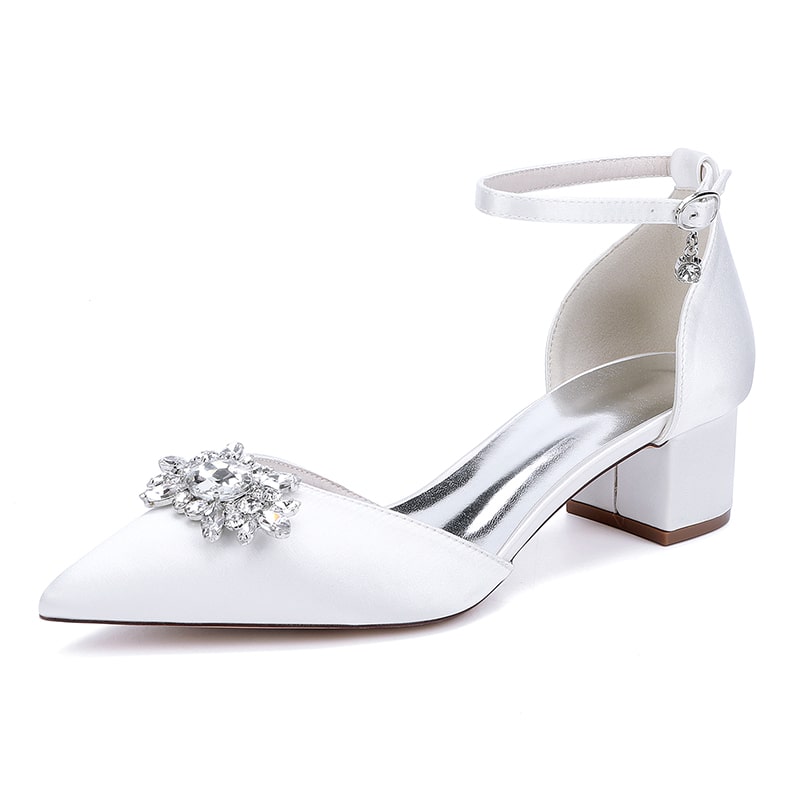 Elegant white chunky heel ankle strap wedding shoes with crystal embellishment on a pointed toe