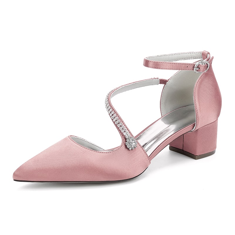 Pink chunky heel bridal heels with elegant straps and decorative embellishments