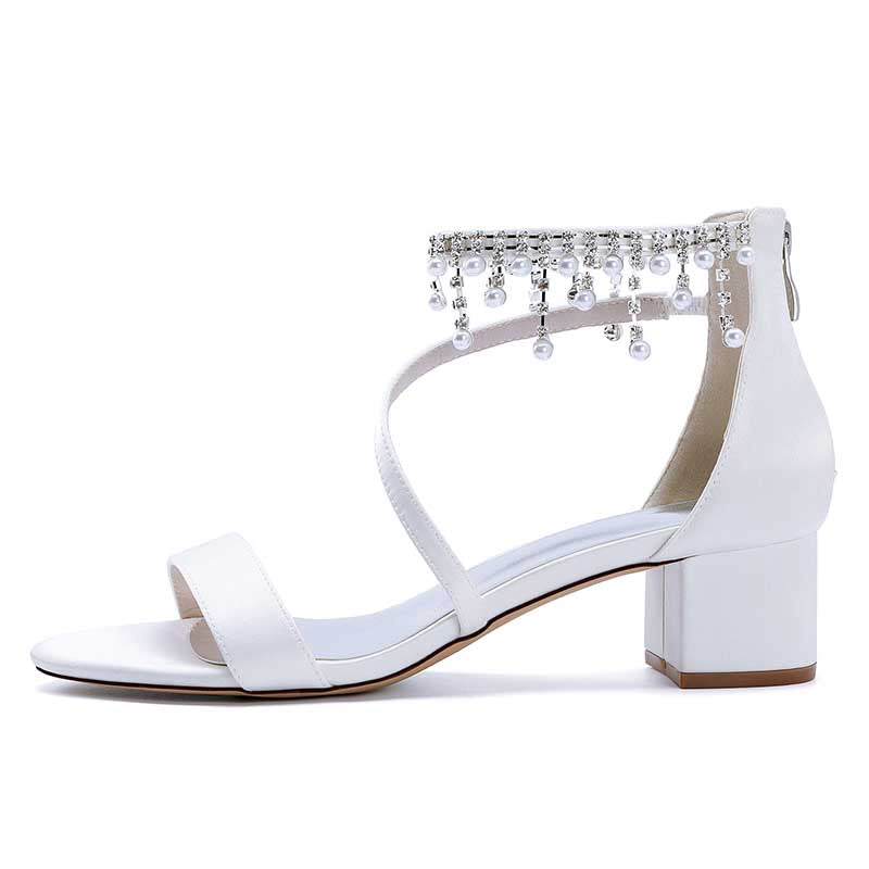 White chunky heel formal shoes with rhinestones featuring an elegant ankle design and a stylish block heel