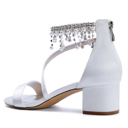 Stylish white chunky heel formal shoes with rhinestones and elegant detailing for special occasions