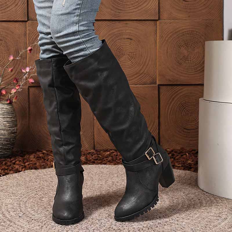 Stylish chunky heel knee-high boots in black with adjustable buckle for a trendy look
