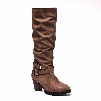Brown chunky heel knee-high boots with buckle details and slouchy design for stylish looks