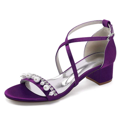 Purple chunky heel prom sandals with pearl embellishments and stylish ankle straps