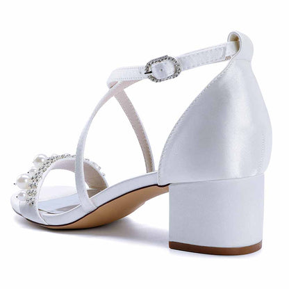 White chunky heel prom sandals with pearl and rhinestone detailing for a stylish look