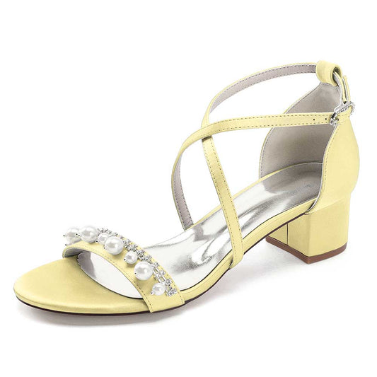 Elegant yellow chunky heel prom sandals with pearl embellishments and an ankle strap