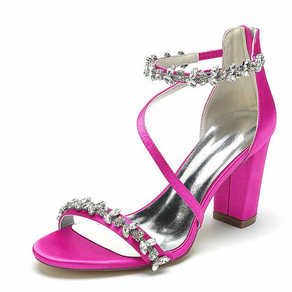 pink chunky heel sandals for event with decorative strap and shiny finish