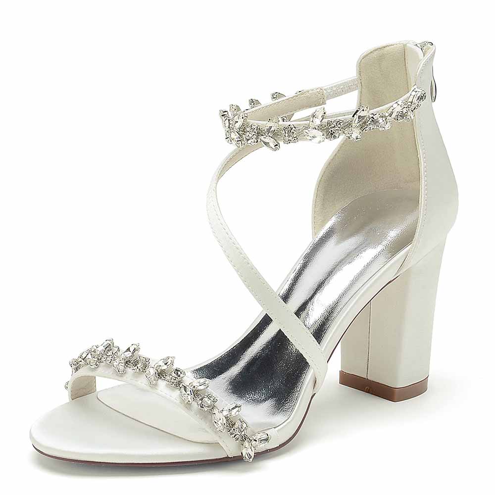Stylish white chunky heel sandals for event with crystal embellishments and elegant straps
