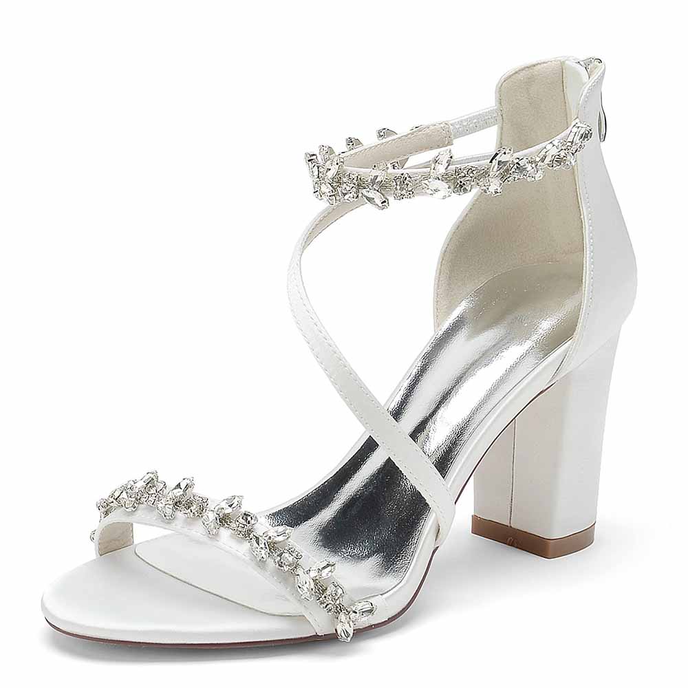 S&DCo. Elegant white chunky heel sandals for event with embellished straps and a stylish design