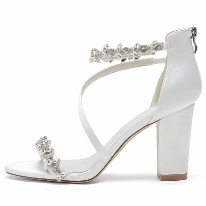 Elegant S&DCo. chunky heel sandals for event with decorative rhinestone straps