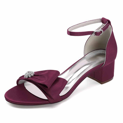Burgundy chunky heel wedding sandals with a bow detail and adjustable strap for a stylish bridal look