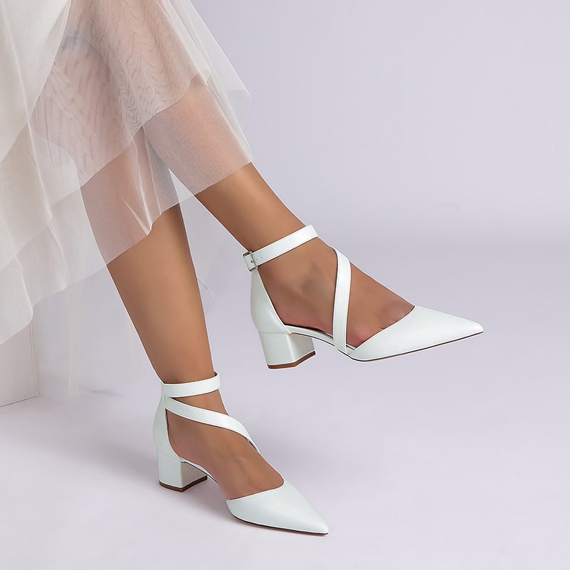 Elegant chunky heel wedding shoes with a pointed toe and ankle strap for brides on their special day