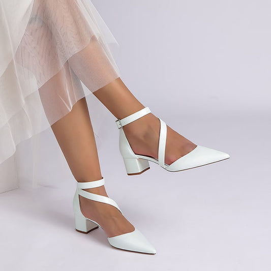 Elegant chunky heel wedding shoes with a pointed toe and ankle strap for brides on their special day