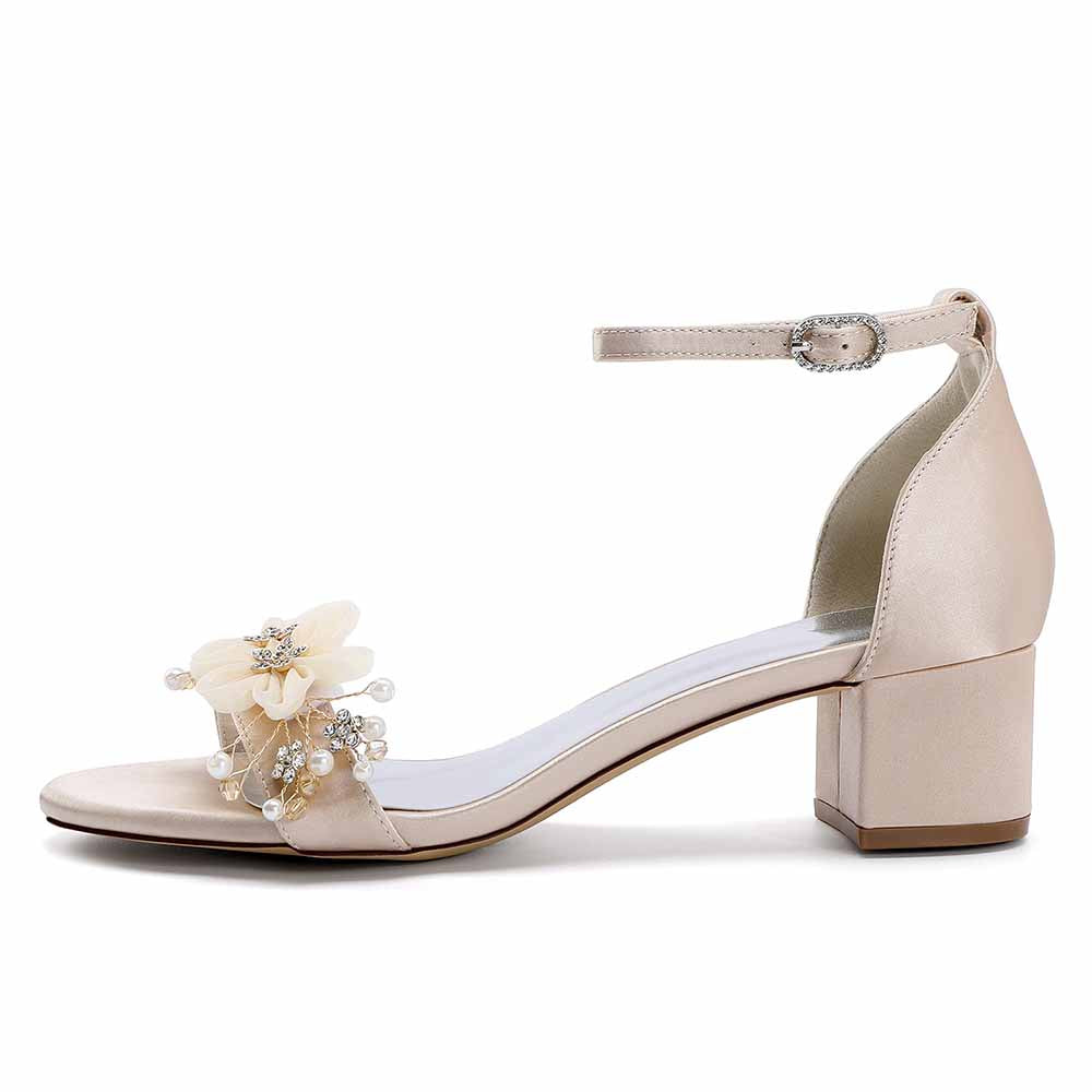 Elegant chunky heeled sandals for brides with floral embellishments and ankle strap design