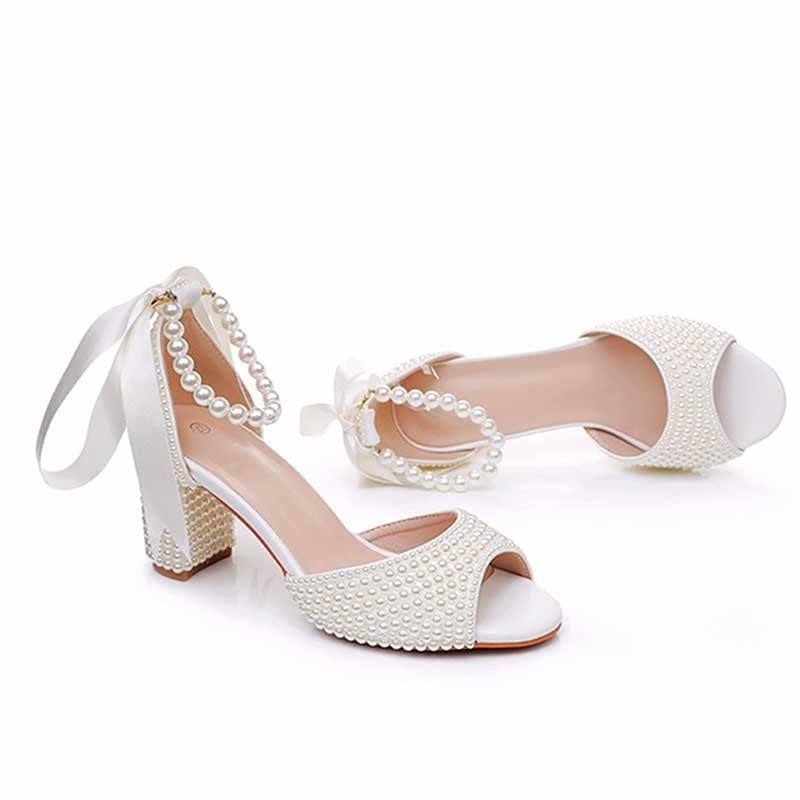 S&DCo. Chunky lace up bridal shoes with pearl accents and stylish design for weddings