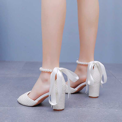 Stylish S&DCo. chunky lace up bridal shoes with pearl details and elegant ribbon ties