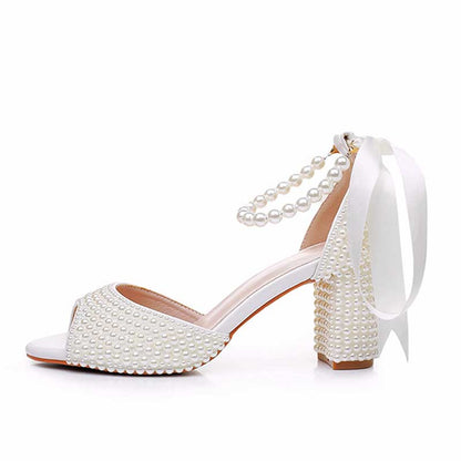 S&DCo. Chunky lace up bridal shoes in white with pearl detail and ribbon ankle strap