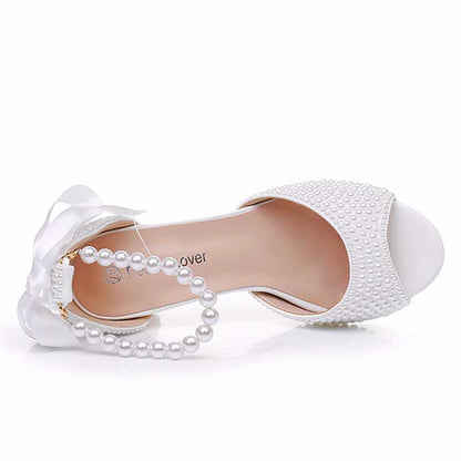 S&DCo. chunky lace up bridal shoes with pearl embellishments and a decorative bow for elegant weddings