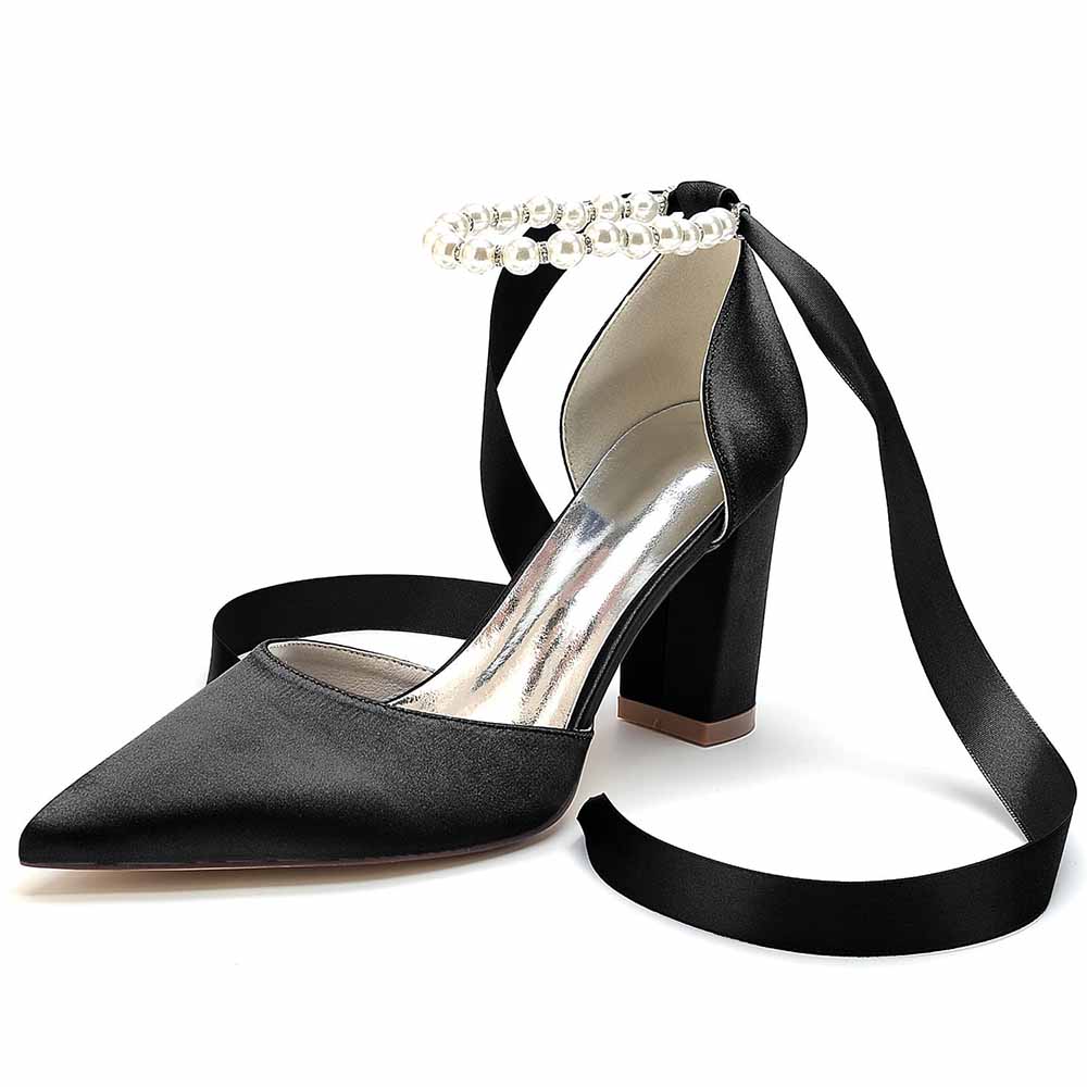 Elegant closed toe lace up bridal shoes in black satin with pearl ankle detail and block heel