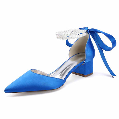 Elegant blue closed toe wedding heels for bride with pearl strap and bow detail