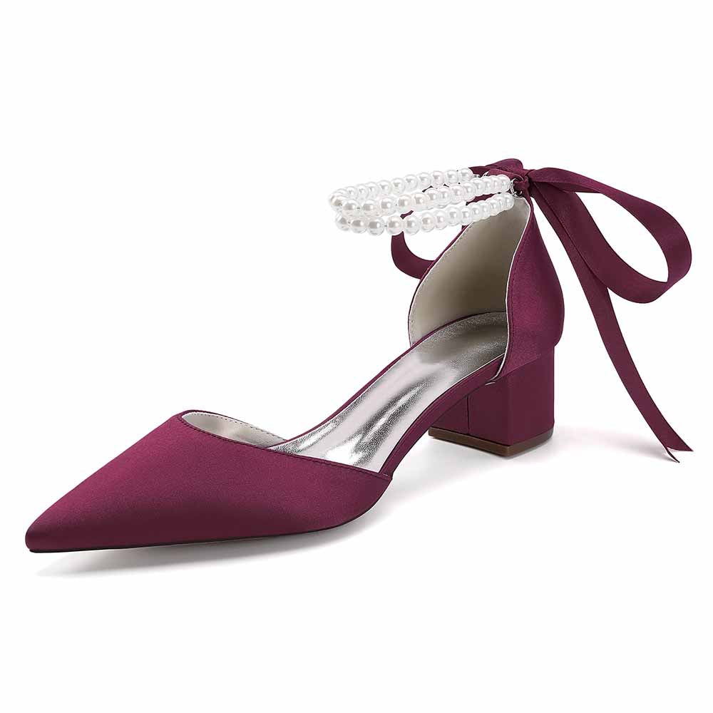 Elegant closed toe wedding heels for bride in burgundy with pearl details and bow for special occasions