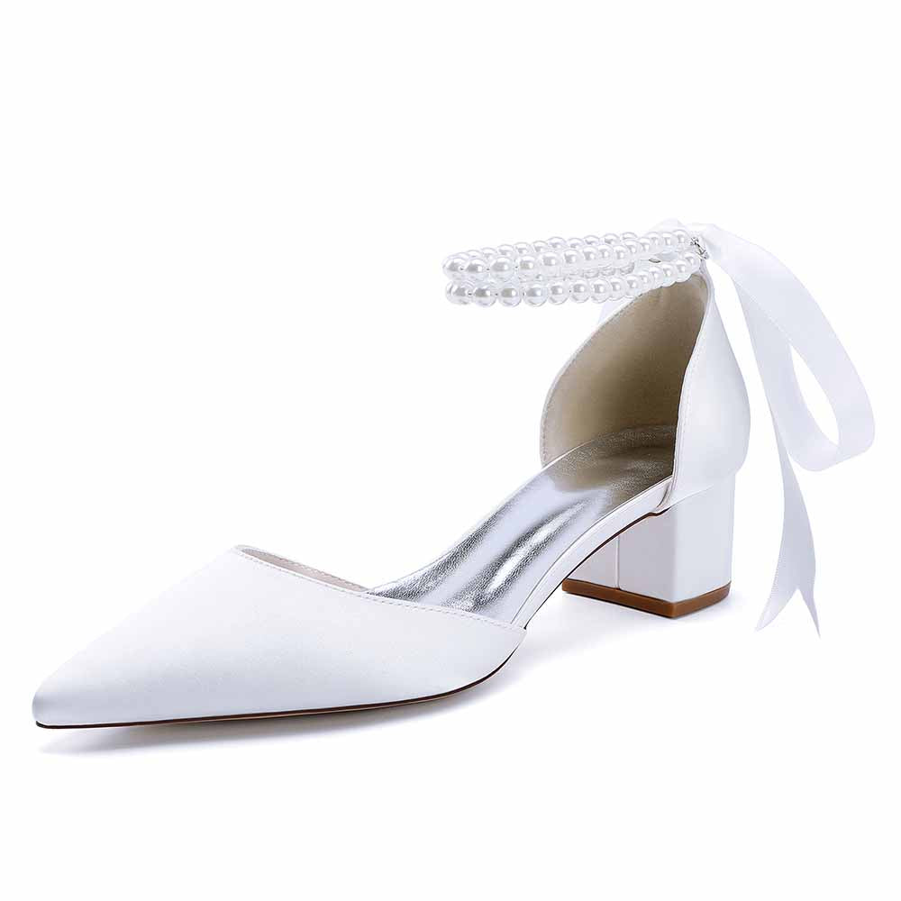 Elegant closed toe wedding heels for bride in white with ankle strap and pearl details