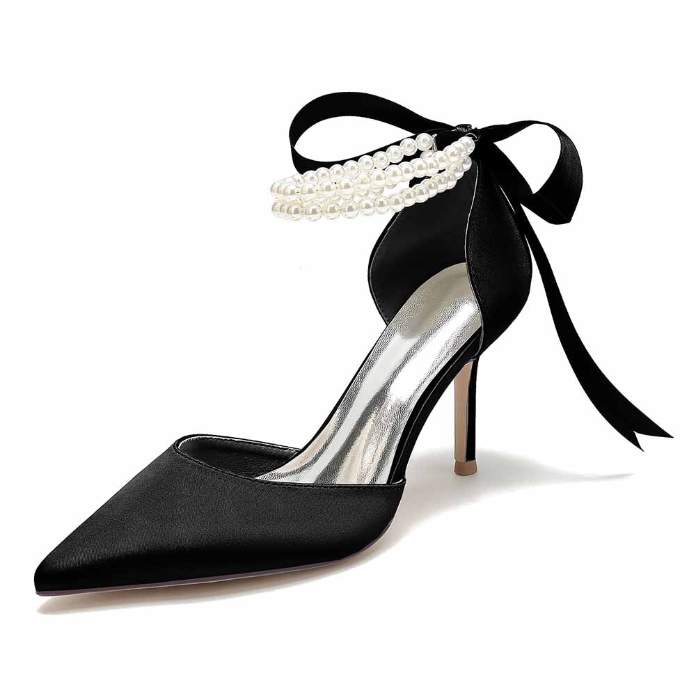 Elegant black closed toe wedding shoes with pearl details and ribbon ankle tie