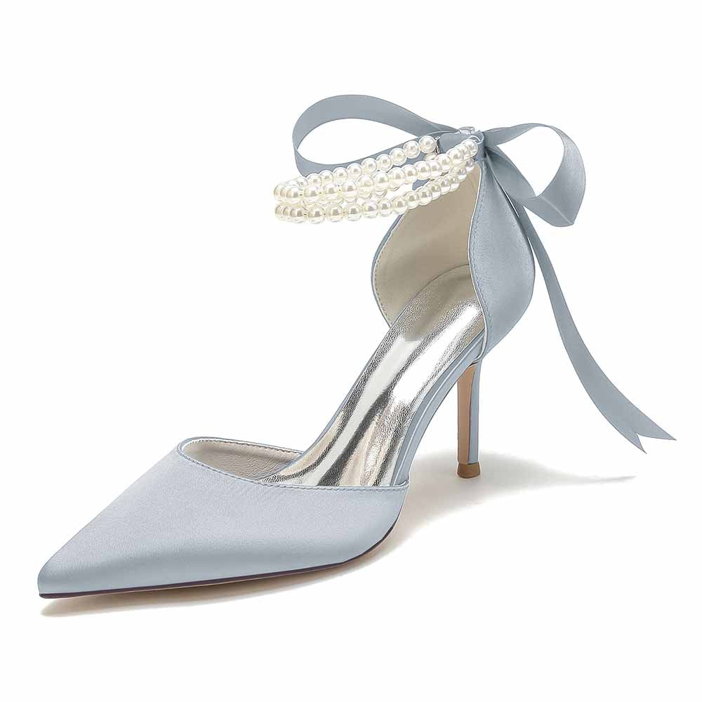 Elegant light blue closed toe wedding shoes with pearl detail and ribbon ankle strap