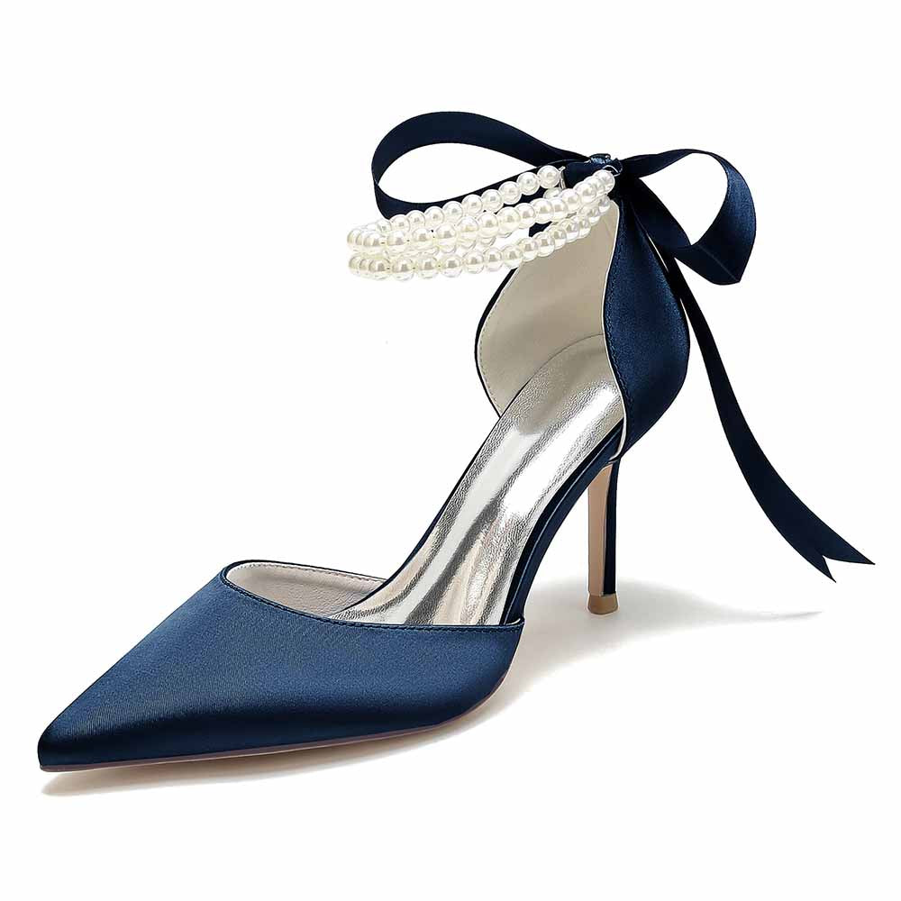 Closed toe wedding shoes in navy satin with pearl bow detail and stiletto heel