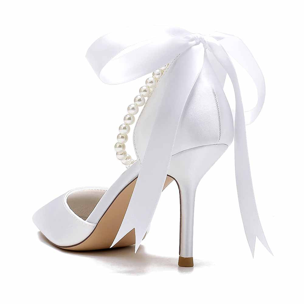 Closed toe wedding shoes in white with a pearl detail and ribbon tie for bridal elegance
