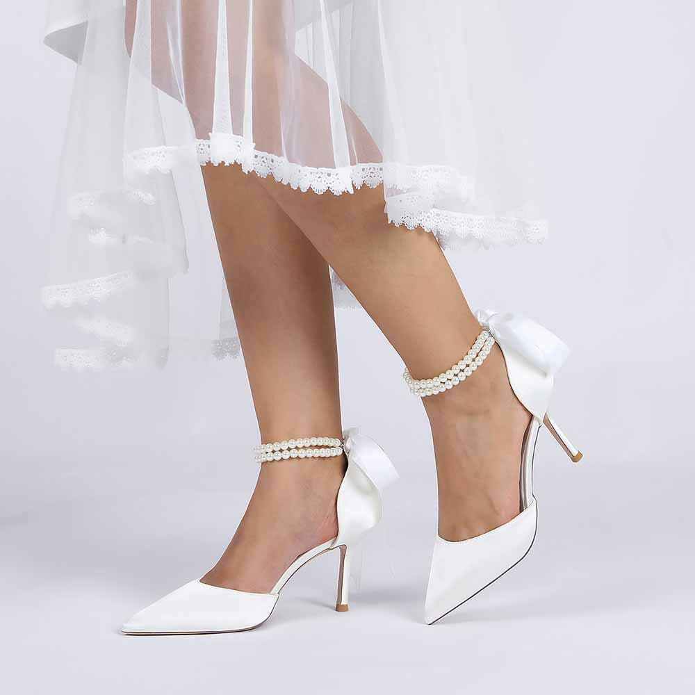Elegant closed toe wedding shoes by S&DCo with a stylish bow and ankle strap for brides