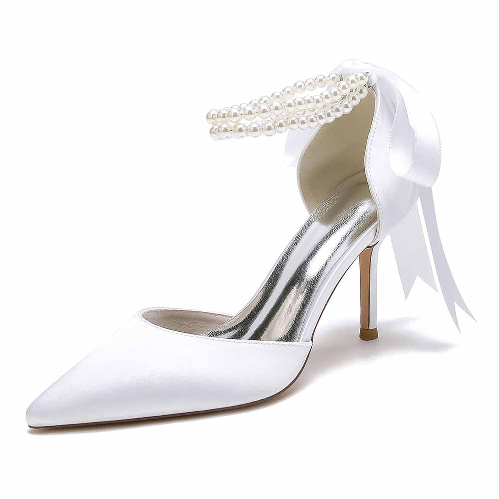 Closed toe wedding shoes with elegant pearl details and a satin finish