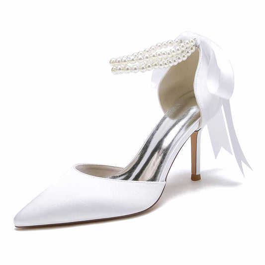 Closed toe wedding shoes with elegant pearl details and a satin finish