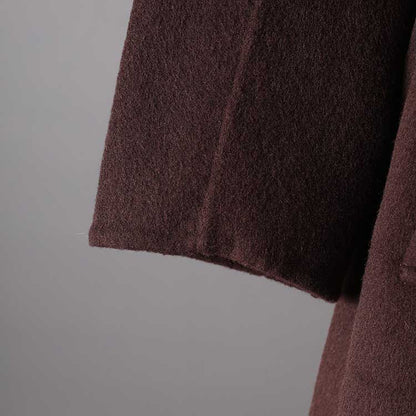 Stylish collarless double belted cashmere coat in rich brown with a modern design