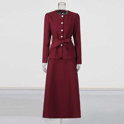 Elegant collarless women's midi skirt set in burgundy with a fitted jacket and long skirt