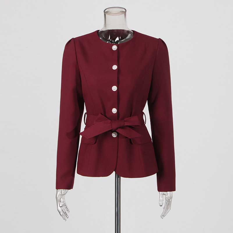 Collarless women's midi skirt set featuring a stylish burgundy blazer with button details and a waist tie