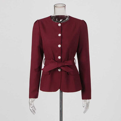 Collarless women's midi skirt set featuring a stylish burgundy blazer with button details and a waist tie