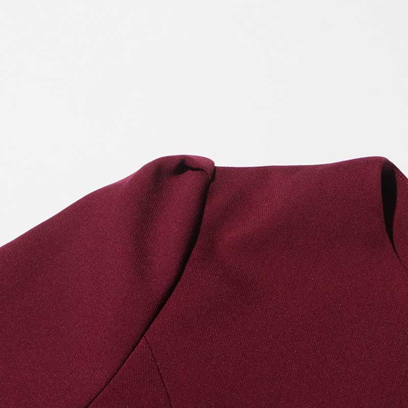 Collarless women's midi skirt set in burgundy fabric showcasing elegant tailoring details