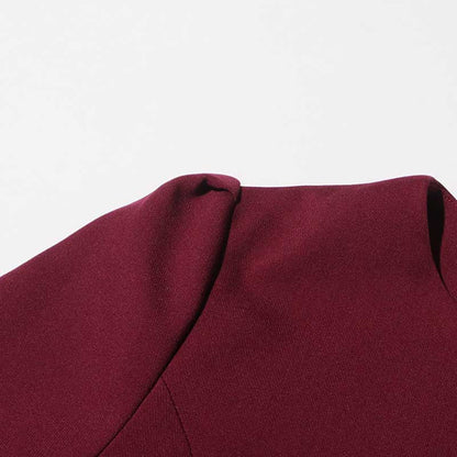 Collarless women's midi skirt set in burgundy fabric showcasing elegant tailoring details