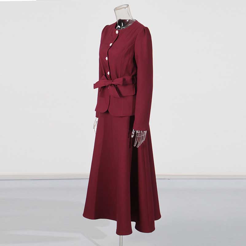 Elegant collarless women's midi skirt set in burgundy with a fitted blazer and flowy skirt