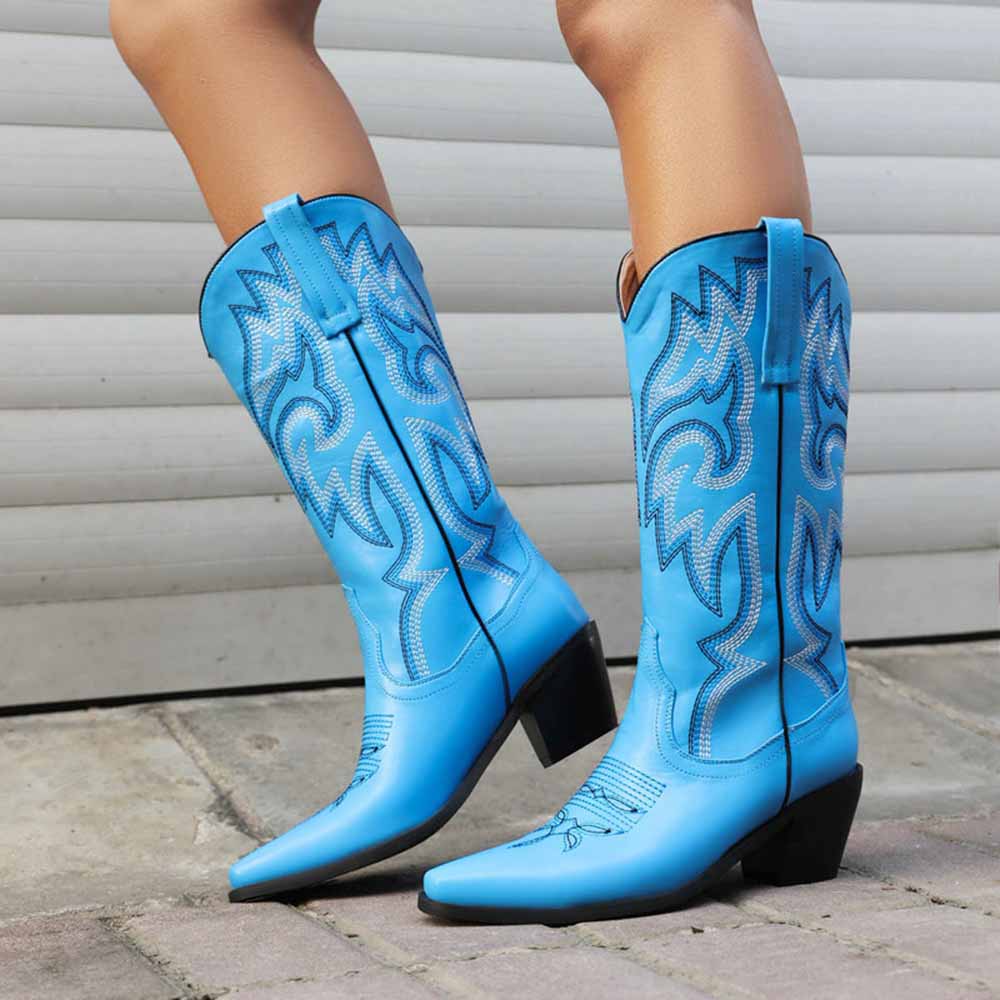 Colorful embroidered cowgirl boots in blue with intricate designs for stylish Western wear